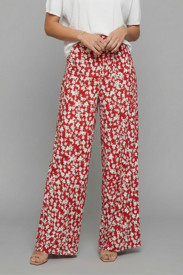 Women’s casual palazzo trousers with floral print and wide legs by Jesie-London, shown in a stylish fit and vibrant design.