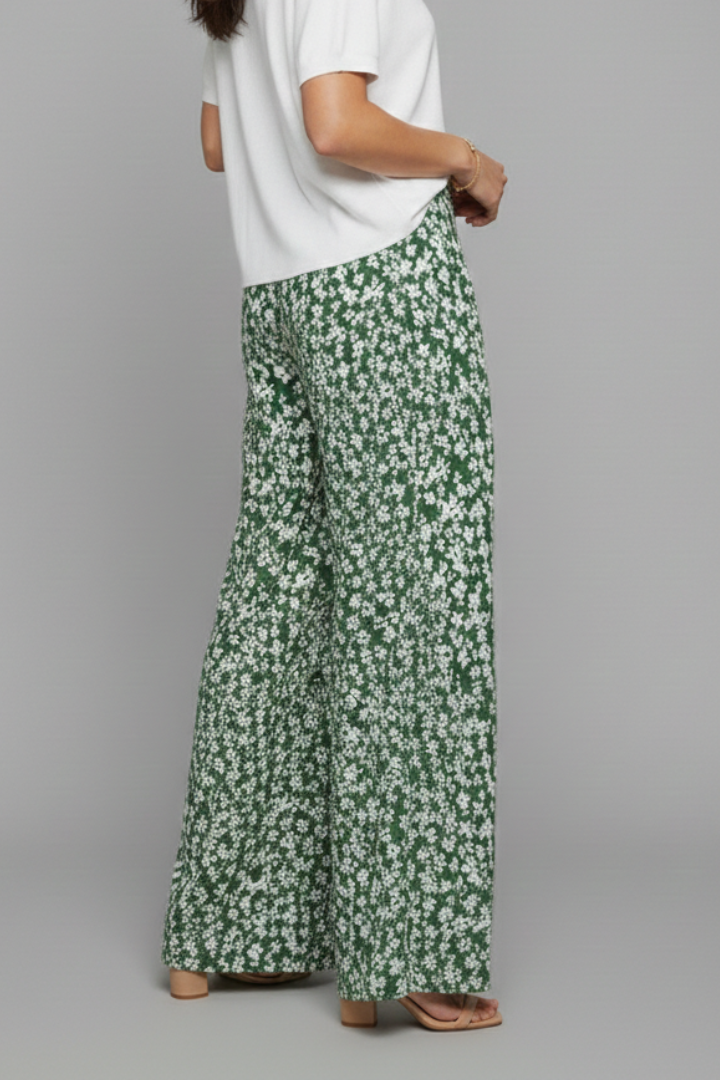 Women’s casual palazzo trousers with floral print and wide legs by Jesie-London, styled with a relaxed fit and vibrant pattern.