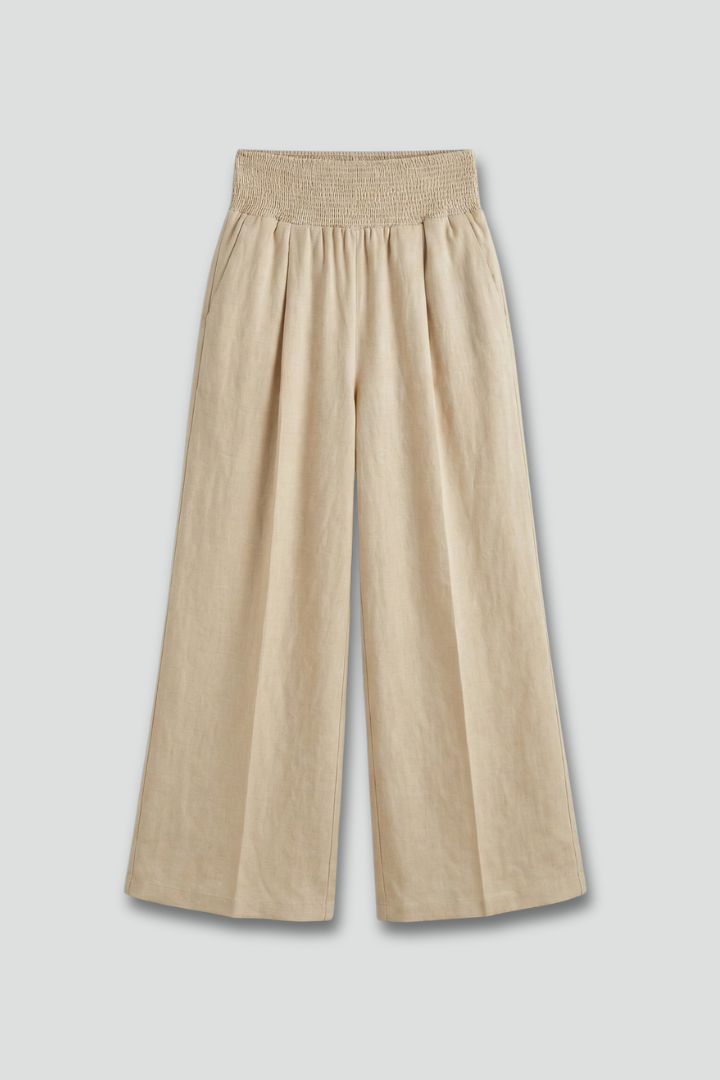 Bethany women's palazzo trousers by Jesie-London featuring high waist and pleats, shown in a stylish, flowing fabric.