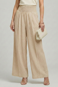 Jesie-London Bethany women’s high-waist palazzo trousers with elegant pleats, styled with a relaxed fit and wide-leg design.