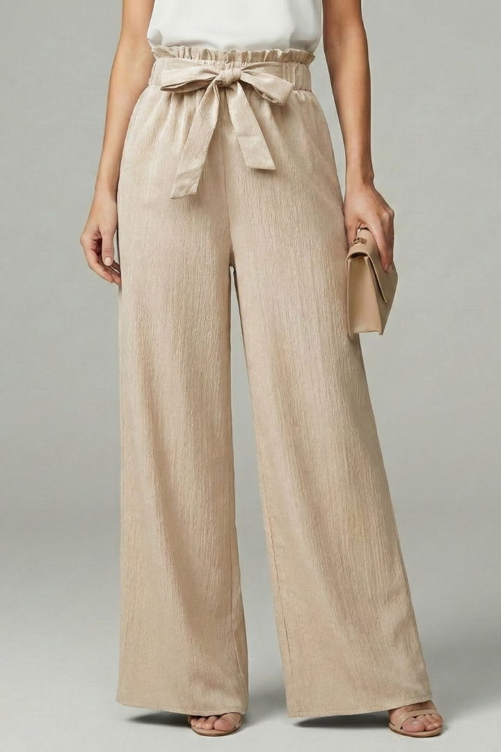 Charlotte women's palazzo trousers by Jesie-London with a tie belt and wide-leg design, shown in a stylish, flowy fit.