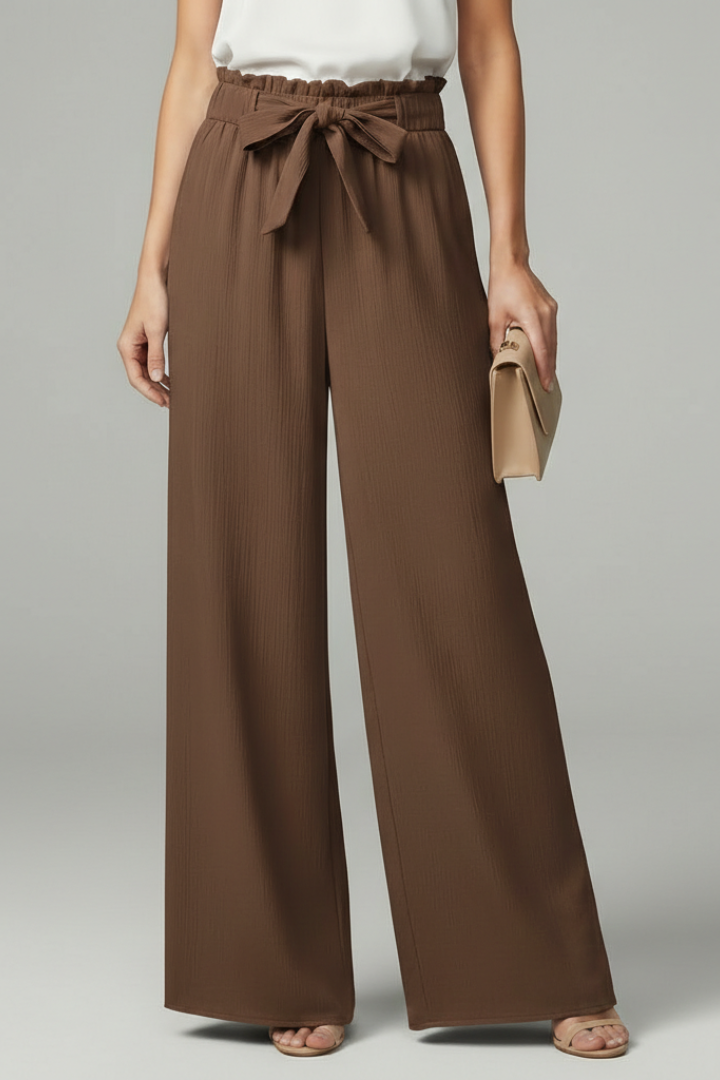 Jesie-London Charlotte women's palazzo trousers with tie belt and wide-leg design, shown in a stylish fabric.