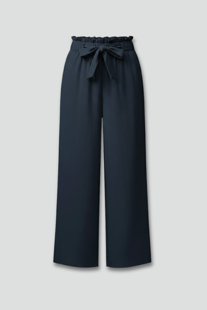 Jesie-London Charlotte women's palazzo trousers with tie belt and wide-leg design, shown in a stylish fabric.