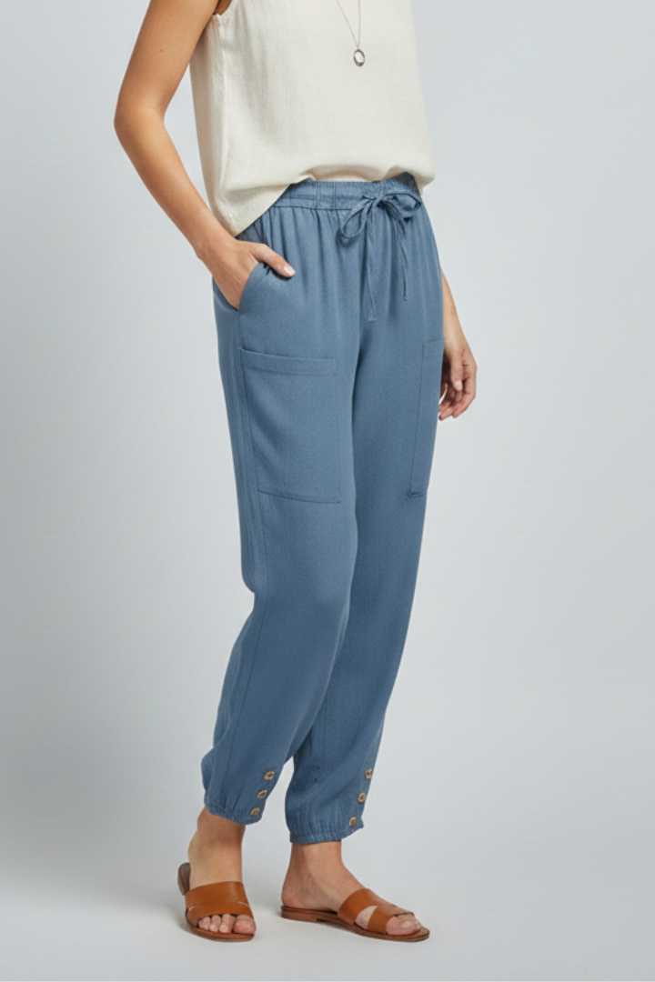 Jesie-London Amelia women's trousers with drawstring waist and button hem, shown in a stylish, casual fit.