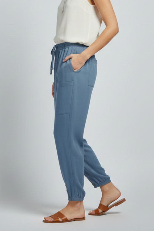 Women’s Jesie-London Amelia trousers with drawstring waist and button hem, featuring a relaxed fit and stylish design.