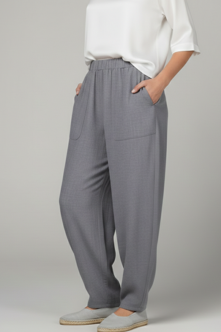 Women’s Jesie-London Bianca trousers with elastic waist and side pockets, tailored fit, in neutral fabric for casual and office wear.