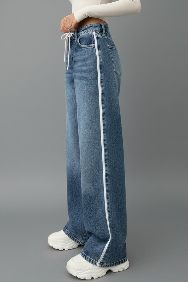Women’s relaxed wide-leg denim jeans with drawstring waist and side stripe detail by Jesie-London.
