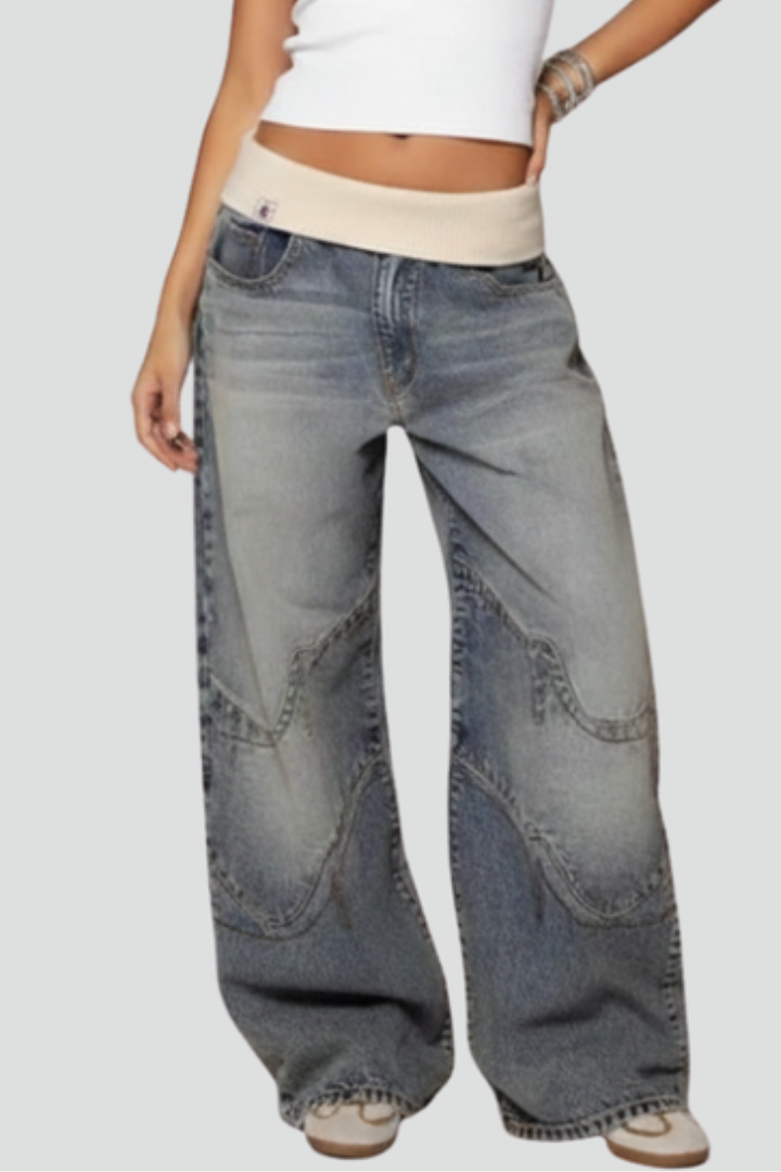 Women’s wide-leg denim trousers with elastic waist and curved seams, casual baggy style by Jesie-London.