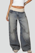 Women’s wide-leg denim trousers with elastic waist and curved seams, casual baggy style by Jesie-London.
