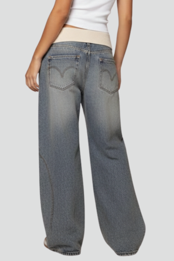 Jesie-London Catherine women's casual wide-leg denim trousers with elastic waist and curved seams, displayed on a model.
