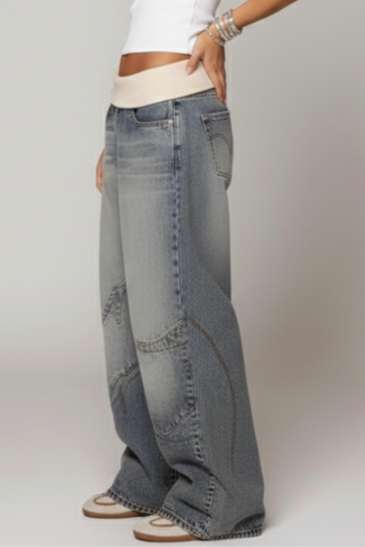 Women’s wide-leg denim trousers by Jesie-London featuring elastic waist and curved seams, casual and comfortable women’s denim pants.