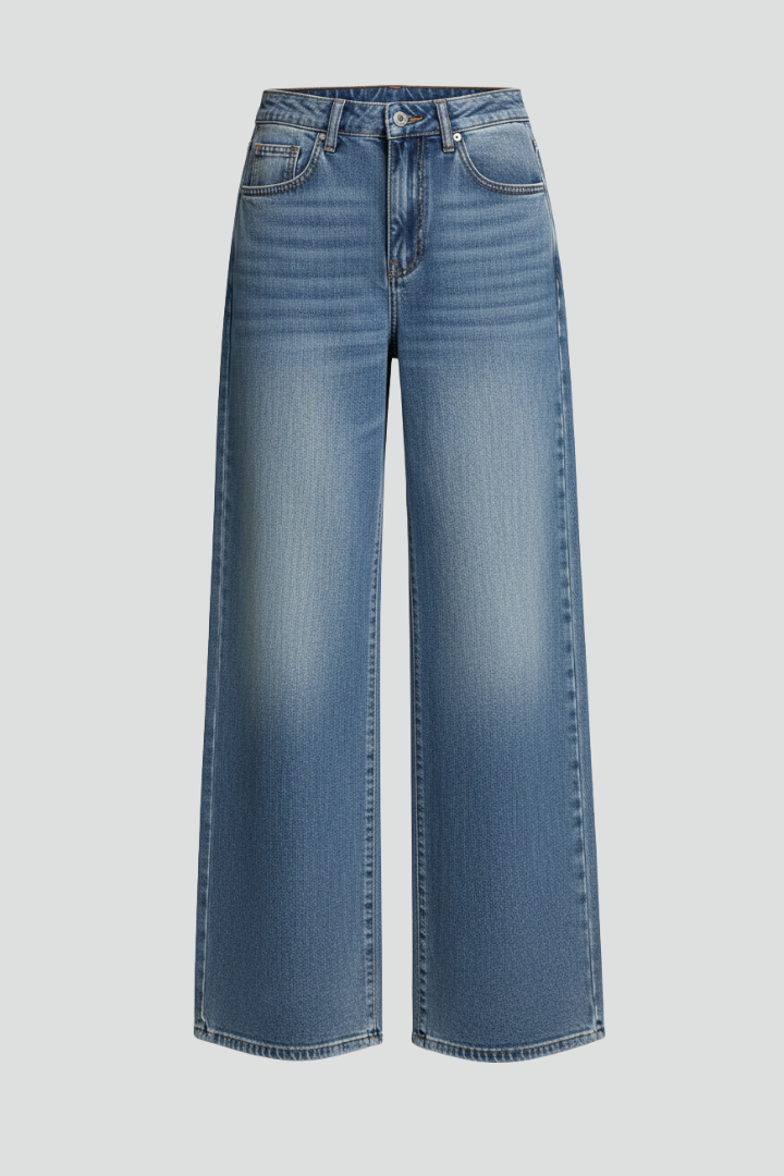 Women’s relaxed wide-leg denim jeans by Jesie-London with front closure and long hem, styled on a model.