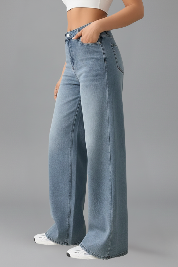 Ariel women's high-rise wide-leg denim jeans by Jesie-London with front closure and long hem, shown on a model.