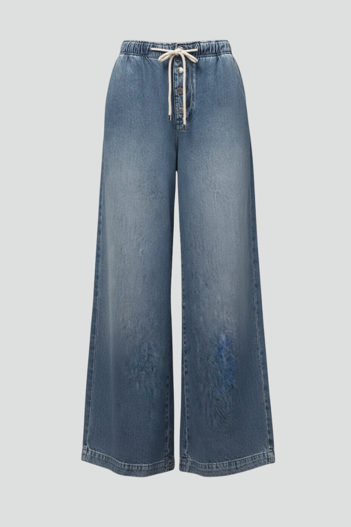 Women’s relaxed wide-leg denim jeans with drawstring waist and long hem by Jesie-London, shown on a model.
