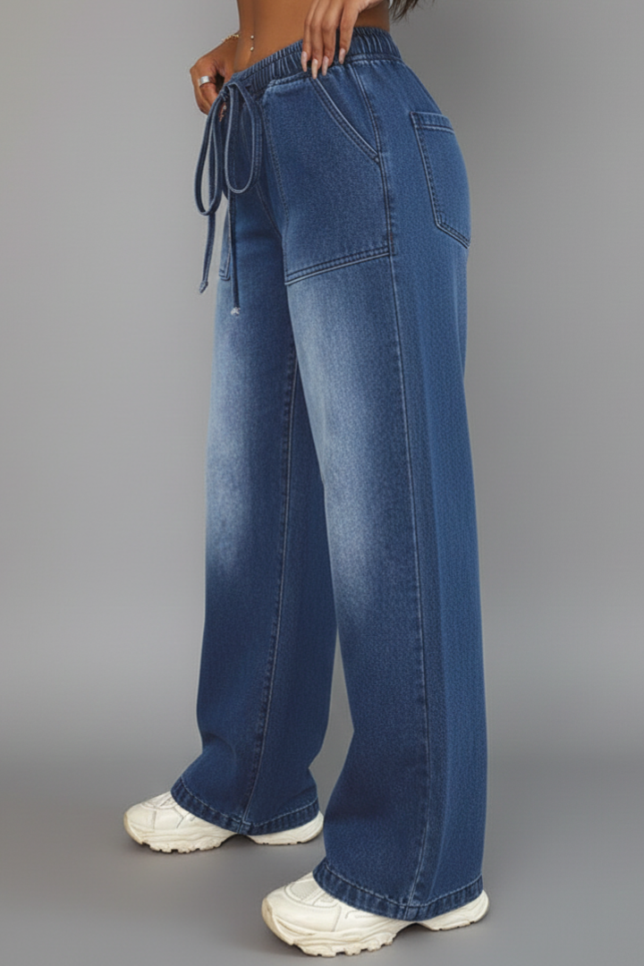 Women’s casual wide-leg trousers by Jesie-London featuring a drawstring waist and patch pockets, perfect for relaxed everyday style.