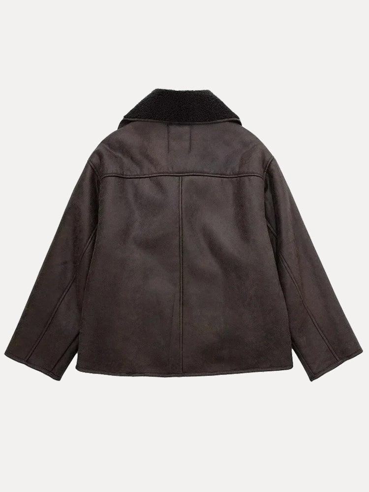 Women’s oversized wool coat with fur collar, classic double-breasted design by Jesie-London, ideal for winter warmth and style.