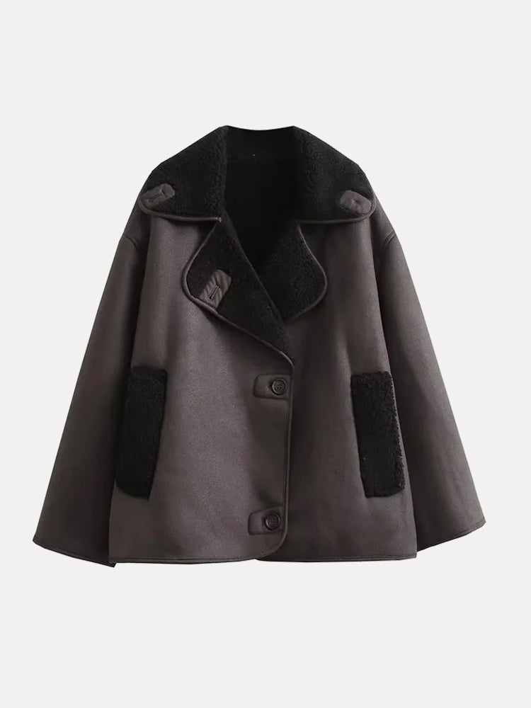 Women’s oversized Jesie-London wool coat with double-breasted design and fur collar, perfect for winter warmth and style.