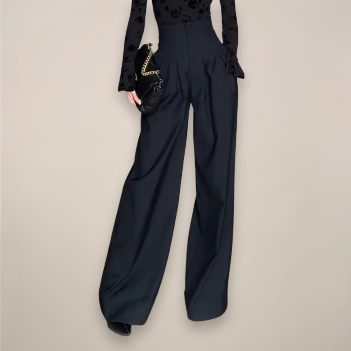 Jesie-London Camille women’s high-waisted wide leg trousers in elegant black tailored fit, styled for a modern, sophisticated look.