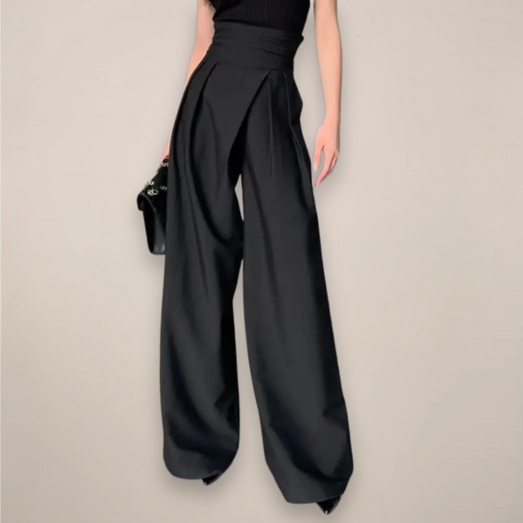 Black women’s high-waisted wide-leg trousers from Jesie-London, tailored fit with elegant, flowing wide-leg design.