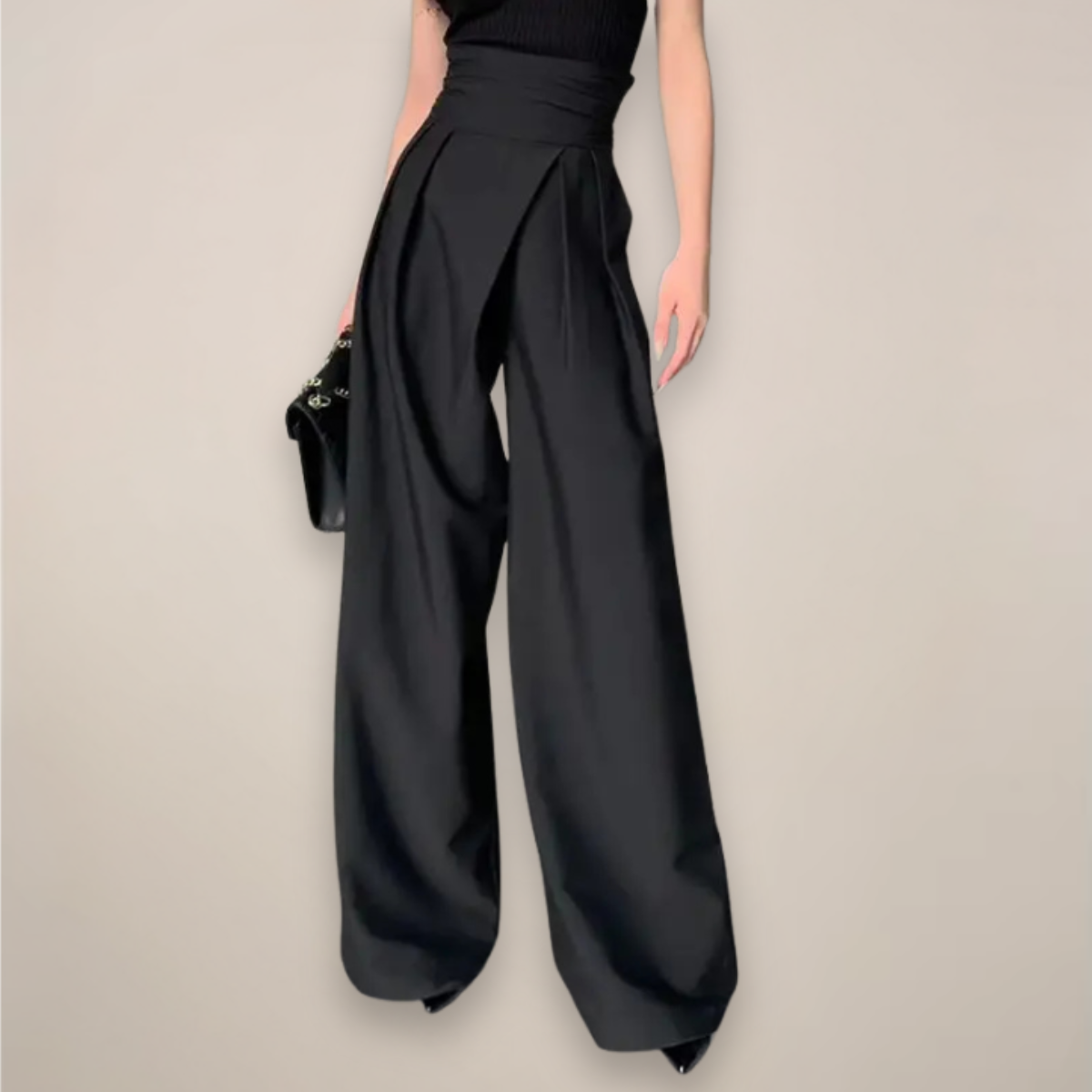 Black women’s high-waisted wide-leg trousers from Jesie-London, tailored fit with elegant, flowing wide-leg design.