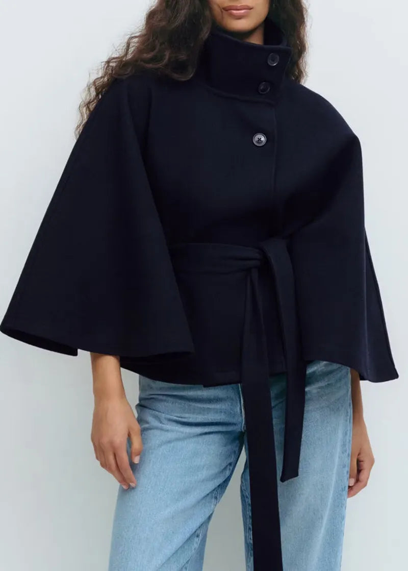 Jesie-London women's spring belted high-neck cape coat with funnel neck, waist belt, and cape sleeves, perfect for layered style.