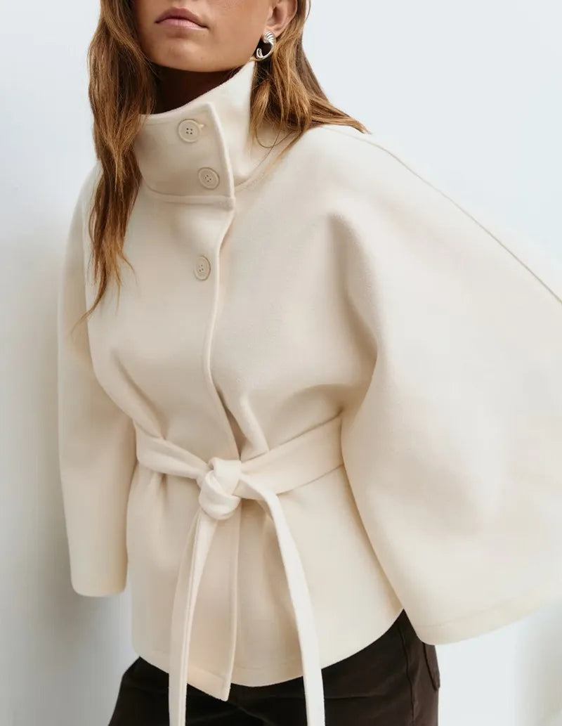 Jesie-London Daisy women's spring belted high-neck cape coat with funnel neck, waist belt, and cape sleeves, stylish and elegant.
