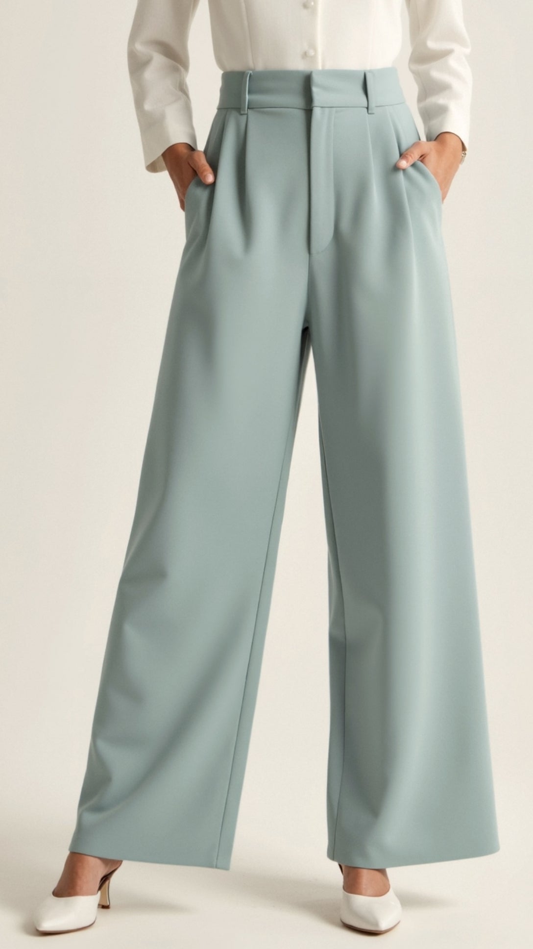 Women’s high waisted wide leg trousers with pleated front by Jesie-London, shown in a stylish front view.