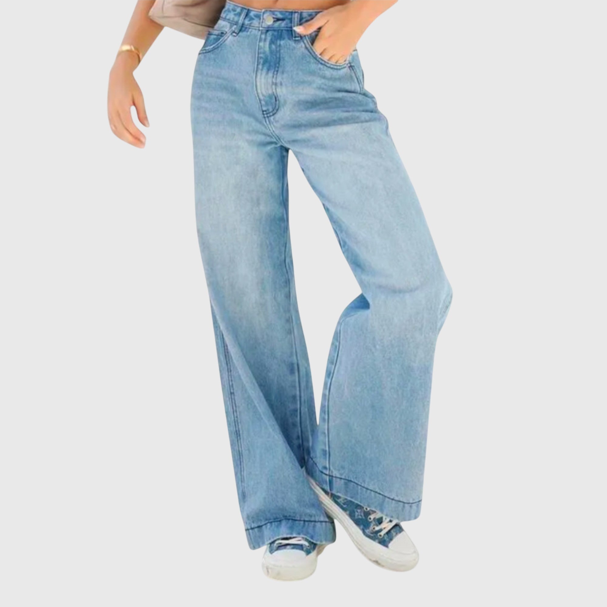 Jesie-London Daisy women's casual baggy denim pants displayed on a model, showcasing relaxed fit and classic blue denim style.