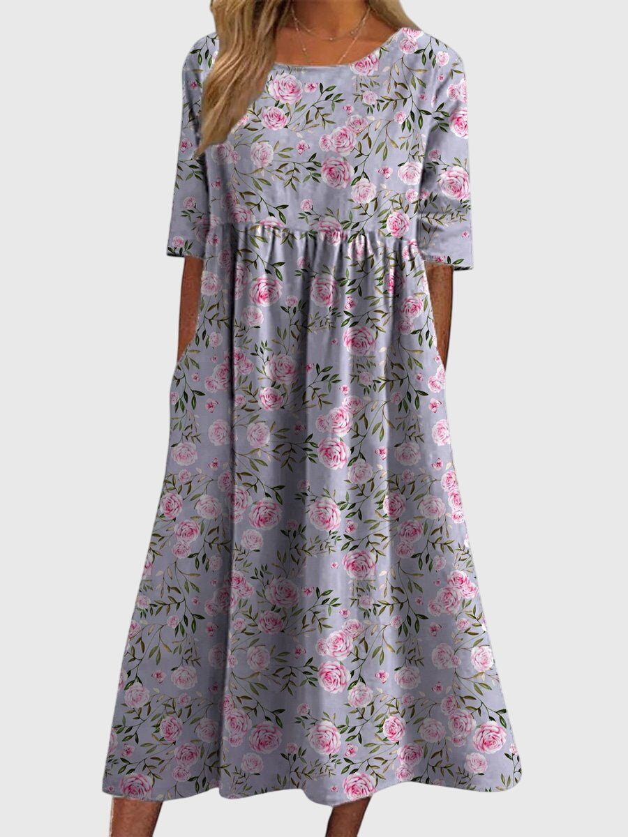 Vintage floral midi dress for women in ruby red by Jesie-London, featuring a classic feminine design and elegant midi length.