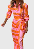 Emma women's striped wrap midi dress by Jesie-London, featuring a stylish wrap design and bold vertical stripe pattern.