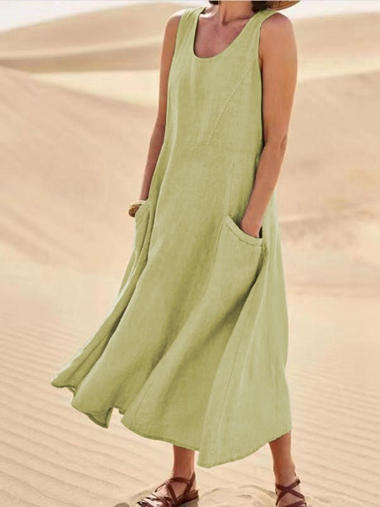 Light linen sleeveless maxi dress by Jesie-London with pockets, perfect for casual summer wear.