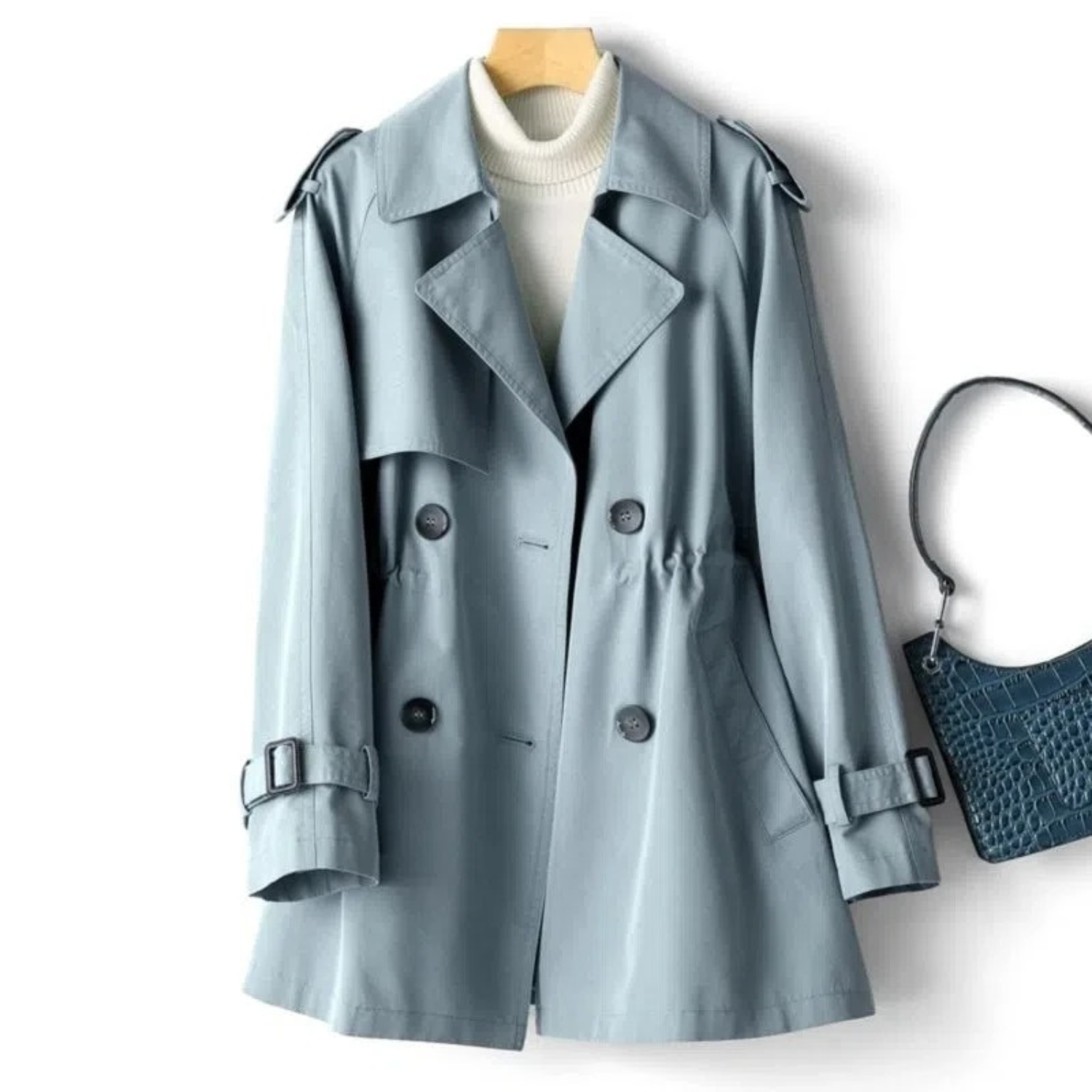 Women’s blue Julia long double-breasted trench coat by Jesie-London, front view showing classic collar and button details.