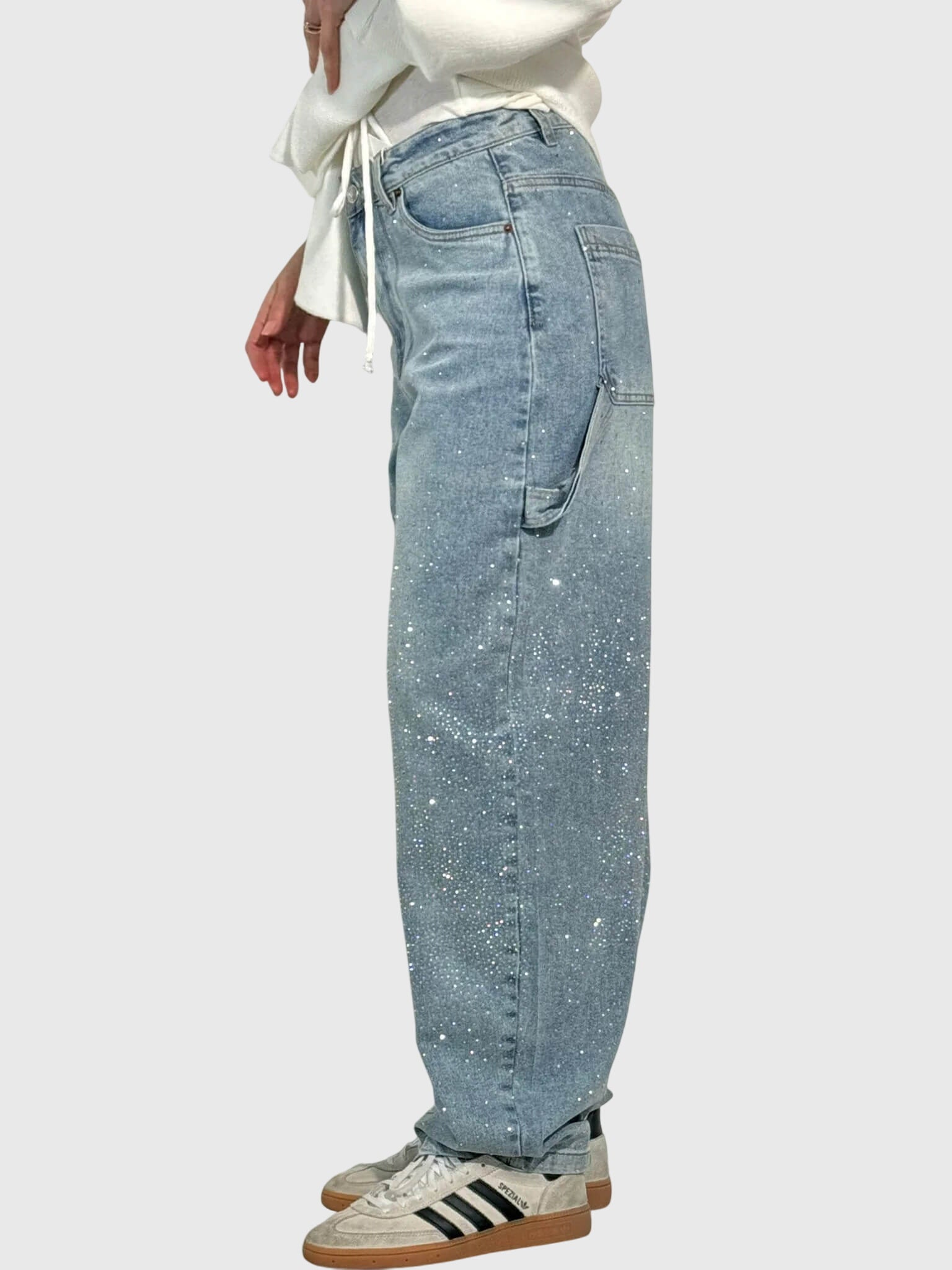Women’s sparkle diamond denim pants by Jesie-London featuring shimmering embellishments and a classic denim fit.