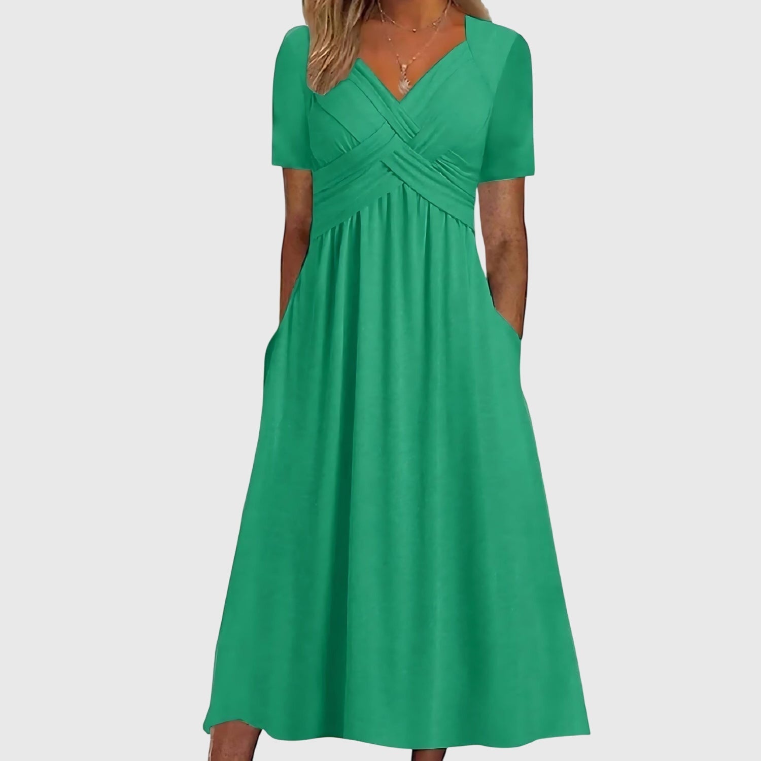 Megan women's V-neck flowy midi dress by Jesie-London, featuring a relaxed fit and elegant fabric in a soft, feminine style.