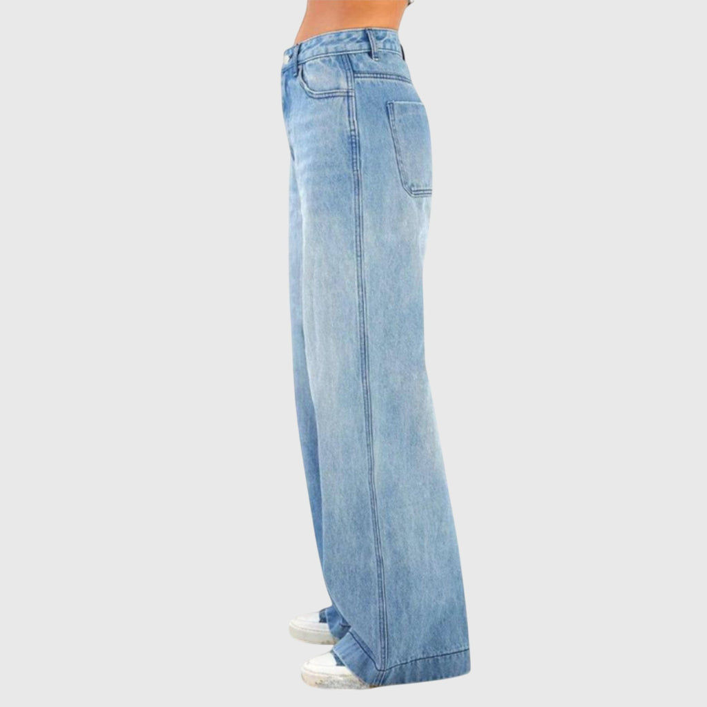 Jesie-London Daisy women's casual baggy denim pants displayed on a model, showcasing relaxed fit and classic blue denim style.