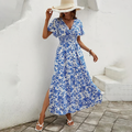 Jesie-London Bianca women's boho printed V-neck short sleeve maxi dress, flowing fabric with colorful floral pattern.