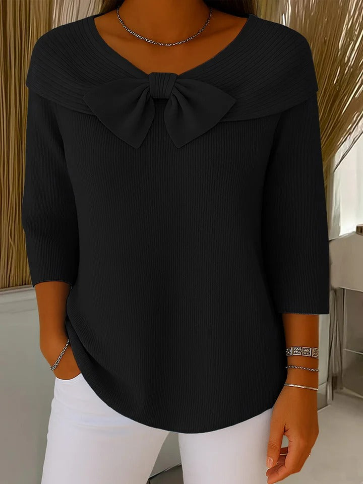 Jesie-London Anna women's three-quarter sleeve top with bow detail, stylish and elegant, shown on a model.