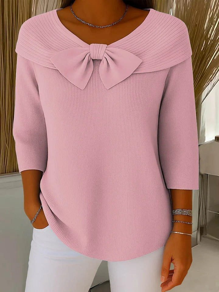 Jesie-London Anna women's three-quarter sleeve top with bow detail, shown in a close-up of the stylish sleeve design.