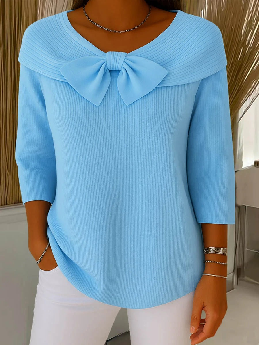Jesie-London Anna women's three-quarter sleeve top with bow detail, showcasing a stylish and elegant design.