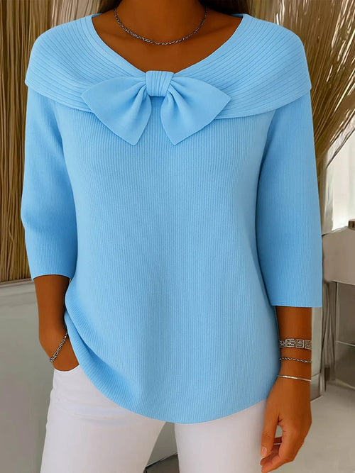 Jesie-London Anna women's three-quarter sleeve top with bow detail, showcasing a stylish and elegant design.