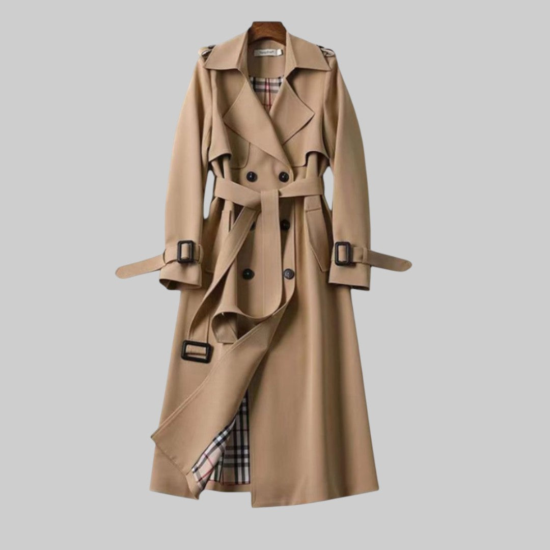 Women’s Jesie-London Emily belted double-breasted long trench coat with lapel collar and button details, shown on a model.