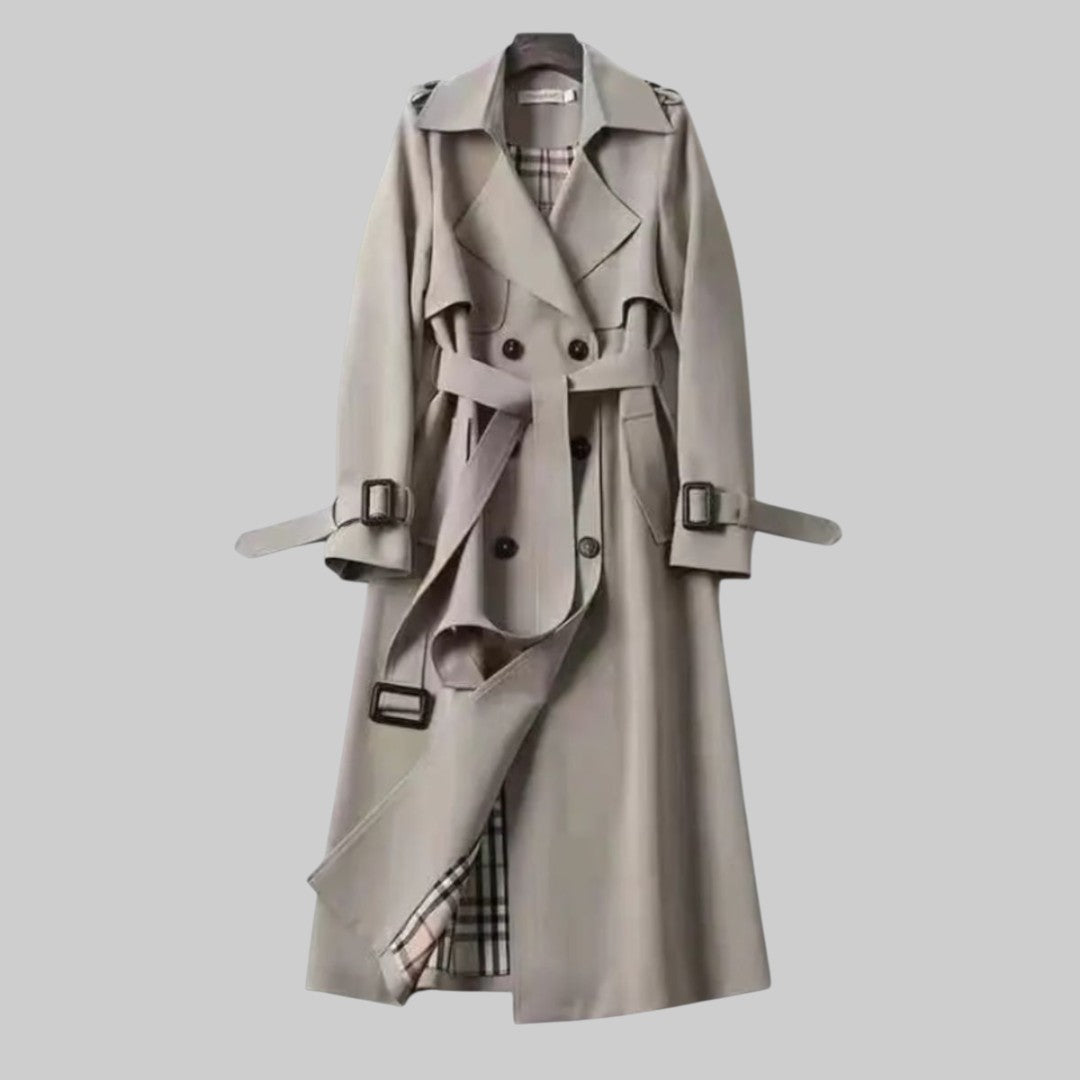 Emily women's belted double-breasted long trench coat by Jesie-London, shown in Jakarta style with classic design and tailored fit.