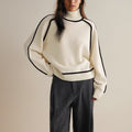 Women’s winter color block turtleneck sweater by Jesie-London, featuring a stylish and cozy design in the image.
