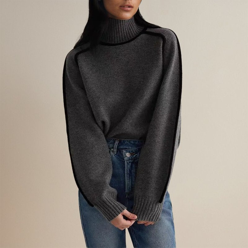 Women’s winter color block turtleneck sweater by Jesie-London, featuring cozy knit fabric and bold color blocking design.