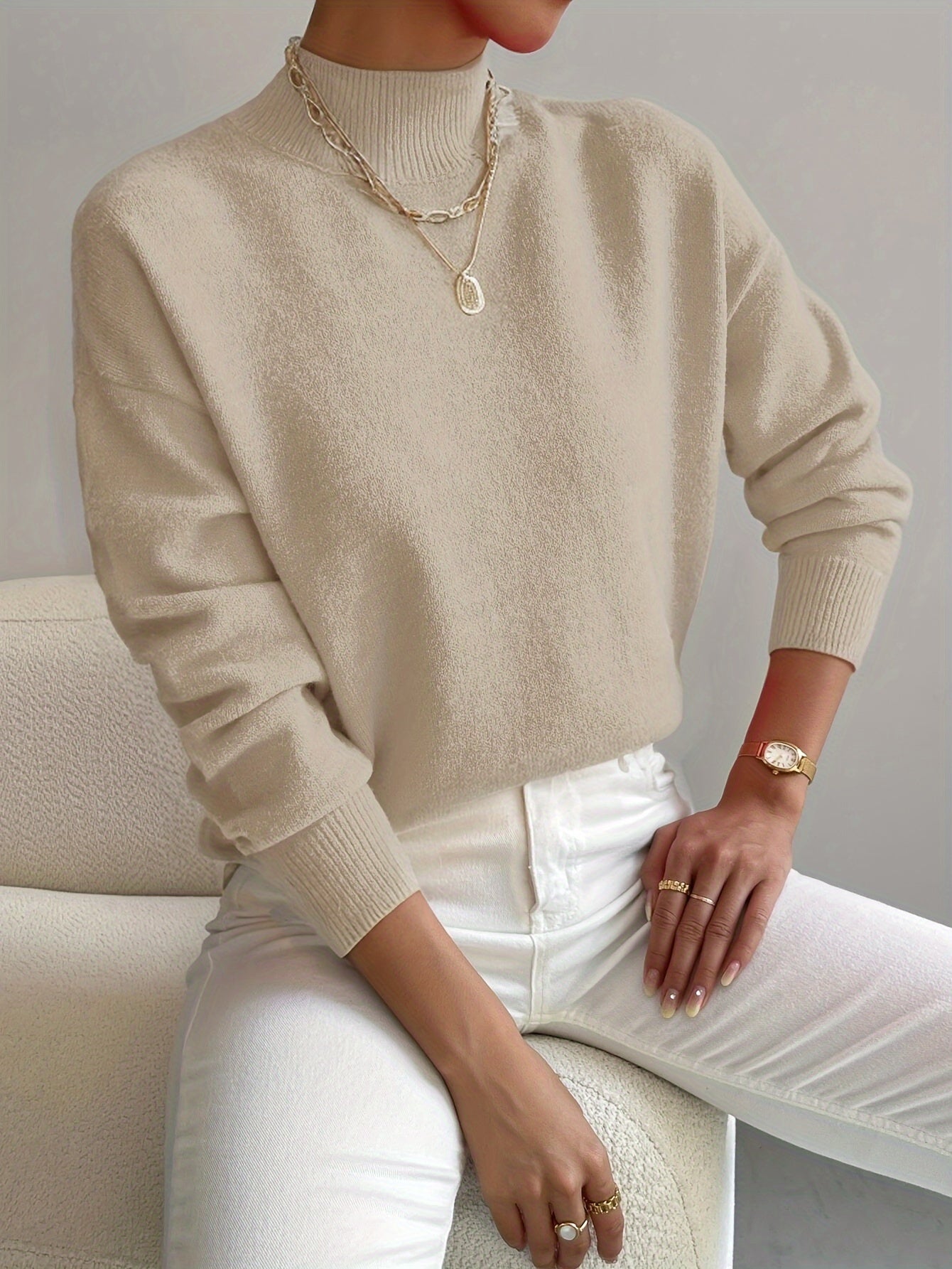Women’s spring mock neck sweater by Jesie-London featuring a comfortable, stylish design in a soft, elegant knit.
