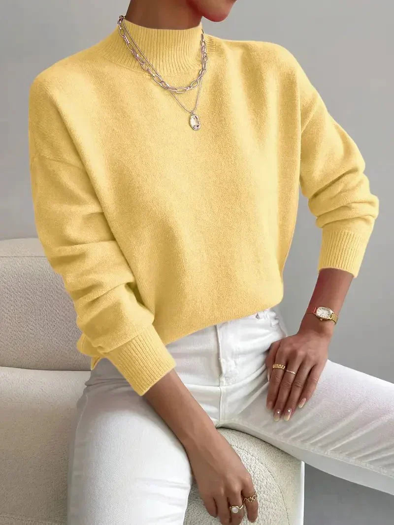 Women’s spring mock neck sweater by Jesie-London featuring a comfortable, elegant design in soft, breathable fabric.