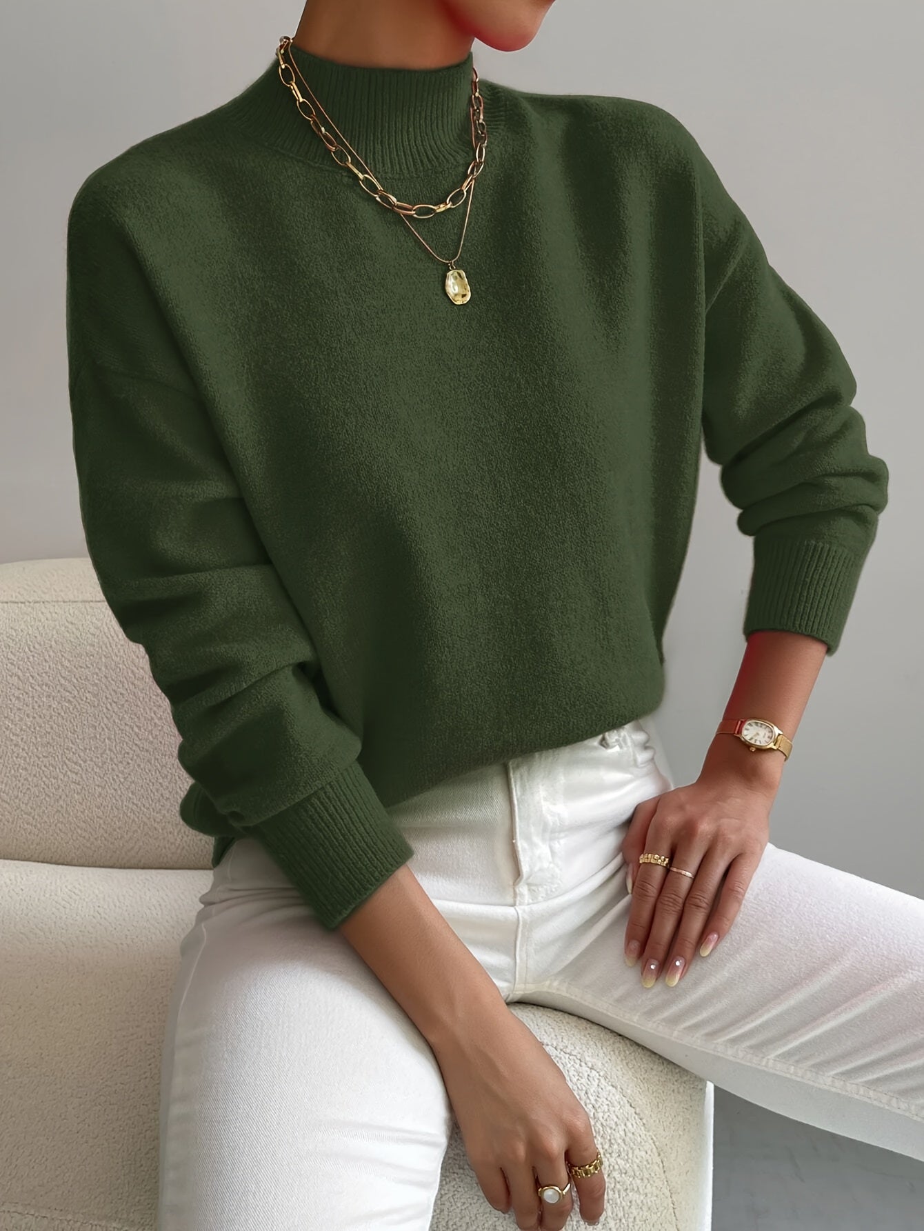 Jesie-London Bethany women's long sleeve pullover sweater top, in elegant, comfortable knit, worn by a woman in a casual setting.