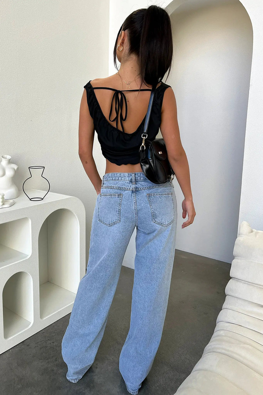Women’s black relaxed straight-leg denim jeans by Jesie-London, featuring a cropped fit and classic denim texture.