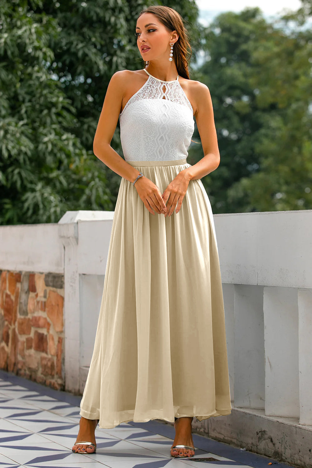 Jesie-London Camille women's wedding guest halter maxi dress with open back in champagne, ideal for elegant wedding attire.