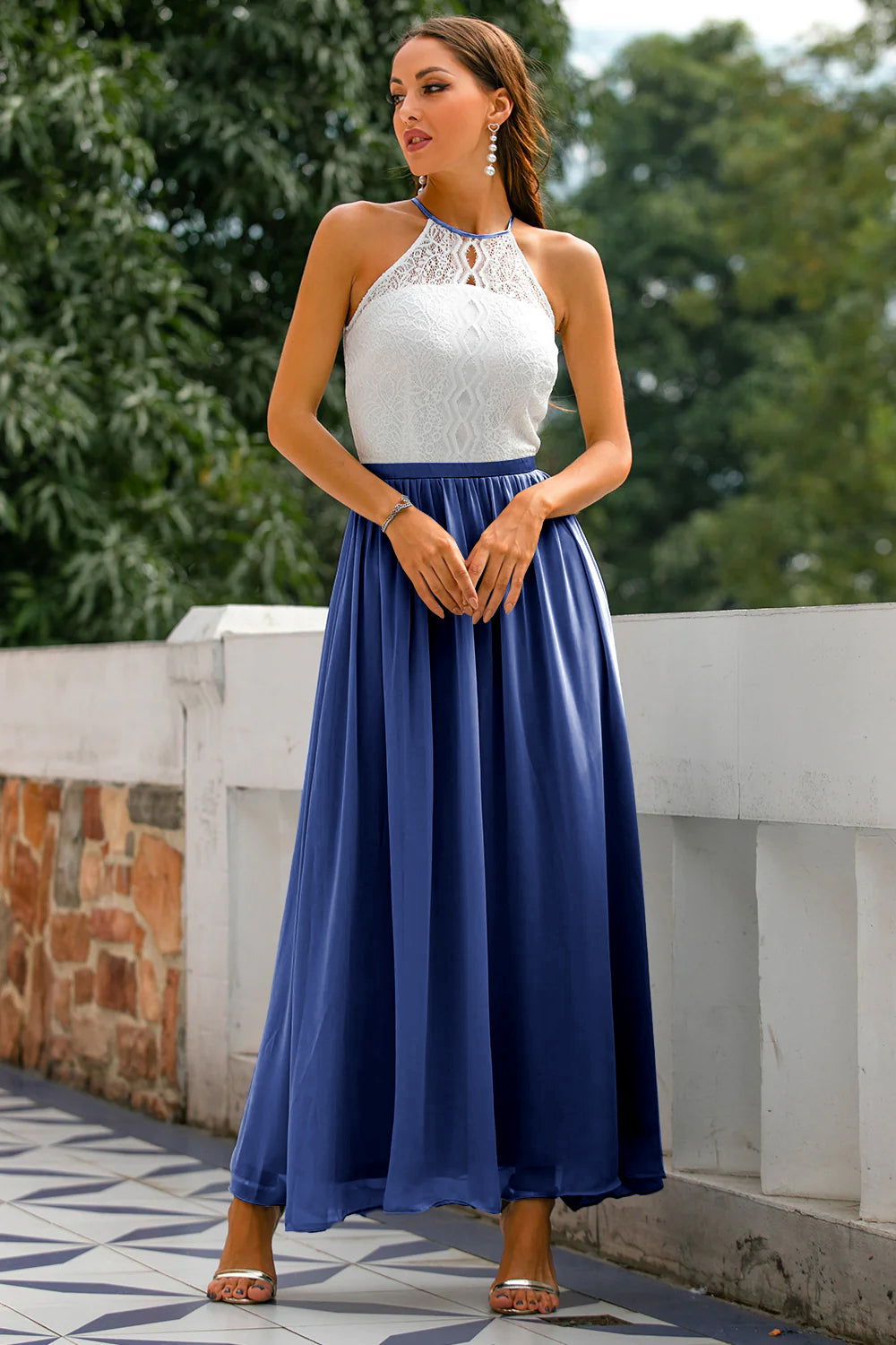 Navy blue Camille women's halter maxi dress for wedding guests, featuring an open back and elegant style by Jesie-London.